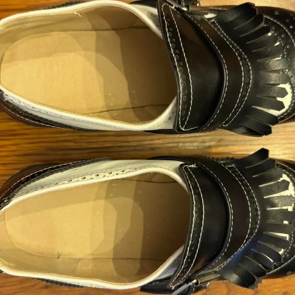 Black and cream leather mary Jane's